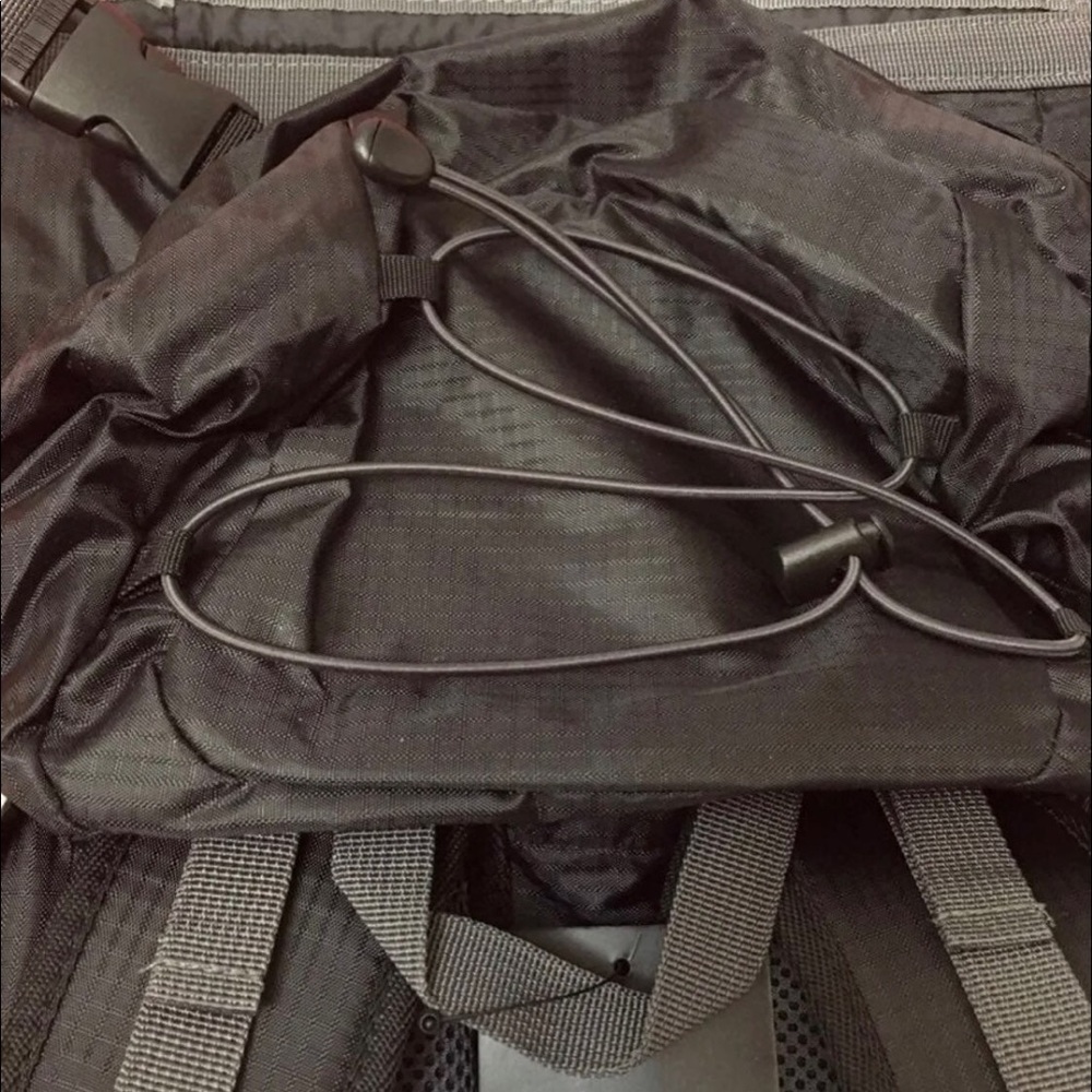 New with tag Stormtech backpack lots of compartments - Picture 9 of 16